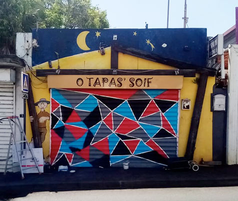 Peinture sur volet roulant de bar